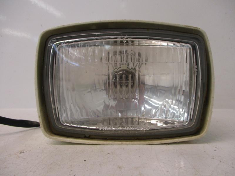 87 Honda TRX 125 Fourtrax OEM Headlight and Plasitc Shell 61301