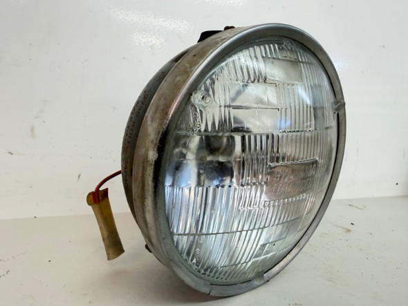1971-1973 Kawasaki F6 Enduro 125 OEM Headlight Bucket and Rim 23003-009