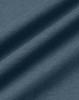 A close-up of soft, premium cotton fabric in a deep blue hue, showcasing its texture and quality.