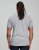 A grey premium cotton short sleeve t-shirt, viewed from the back, featuring a logo on the design.