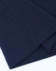 A navy blue long-sleeve tee shirt made of premium cotton, featuring stitched hems and a logo.