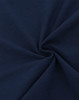 A close-up of navy blue cotton fabric, showcasing a smooth and soft texture with a spiral pattern.