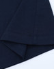 A navy blue long-sleeve cotton tee shirt featuring a hemmed finish and a logo on the sleeve.