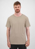 A beige men's short sleeve tee displayed on a male model, featuring a logo on the front.