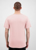 A men's short sleeve tee in a soft pink colour, featuring a plain design and a logo on the back.