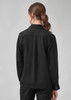 A women's long sleeve shirt in black, featuring a collar and buttoned cuffs, shown from the back.