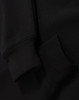 A black unisex premium fleece oversized hoodie with ribbed cuffs. The fabric appears soft and cozy.