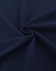 A fabric swatch in navy blue, showcasing a smooth, textured cotton/poly pique weave.
