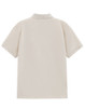 A classic short-sleeve polo shirt in beige with a collar and a logo on the back.