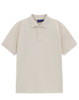 A men's short-sleeve polo in a soft beige colour, featuring a collar and a logo on the chest.