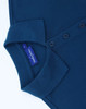 A navy blue ladies' classic cotton/poly pique short sleeve polo with a collar and button detailing. It has a logo tag.