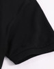 A black men's ultrafine cotton pique polo featuring short sleeves and a smooth texture, with a logo present.