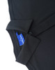 A black polo shirt with a collar, featuring a button and a tag inside.