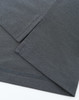 A high-performance grey polo with a smooth texture and a logo. Features short sleeves and fine stitching details.