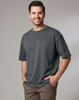 A unisex heavy cotton oversized tee in slate grey, featuring a relaxed fit and short sleeves, with a logo present.