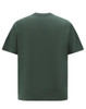 A dark green unisex oversized cotton tee with a simple, plain design and short sleeves. It features a logo on the front.