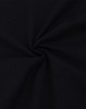 A dark black oversized tee made from heavy cotton, featuring a smooth, twisted fabric texture.