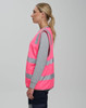 A pink Hi Vis safety zip vest with reflective stripes and utility pockets, displayed on a model from the side.