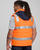 A unisex hi vis hooded puffer vest in orange with reflective stripes, featuring a navy hood and a logo.