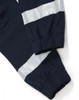 Navy work pants with reflective tape and cuffed ankles, featuring a logo on the fabric.