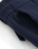 A pair of navy blue work pants featuring a flexible material and pockets, with an elastic waistband.