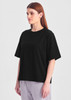 A black box tee with short sleeves, displayed on a model against a plain background.