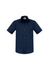 A navy short sleeve button-up shirt featuring a collar and a chest pocket, with a logo on the tag.
