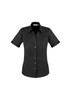 A black short sleeve button-up shirt with a fitted design and rolled sleeves, featuring a logo.