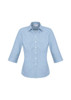 A women's 3/4 sleeve button-up shirt in a light blue check pattern, featuring a classic collar and a logo.