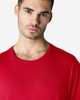 A red Gildan Softstyle Adult T-Shirt displayed on a model with a simple round neckline and a neutral expression.