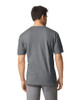 A grey Gildan Softstyle adult t-shirt displayed from the back, featuring a simple design and no visible logos.