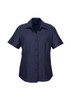 A short-sleeve, button-up women's shirt in navy blue, featuring a sleek design and a logo on the label.