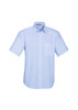 A light blue short sleeve button-up shirt with a chest pocket and a collar. It features a logo on the label.