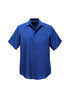 A short-sleeved button-up shirt in a deep blue hue with a single chest pocket and a logo.