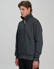 A grey 1/2 zip collar fleecy jumper featuring a logo, designed for warmth and comfort.