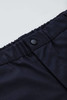 A close-up of black men's comfort waist cargo shorts featuring a button closure and elastic waistband.
