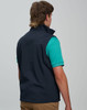 A navy men's softshell vest with a high collar, featuring a logo, shown from the back. 