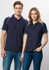 A navy short sleeve polo shirt for men and women, featuring light blue accents and a logo.