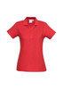 A red ladies' polo shirt with a collared neckline and short sleeves, featuring a logo.