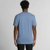 A plain faded blue t-shirt viewed from the back, featuring short sleeves and a relaxed fit. A plain faded blue t-shirt viewed from the back, featuring short sleeves and a relaxed fit.
