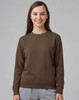 A brown crew fleece sweatshirt on a model, featuring long sleeves and a round neckline, with a logo.
