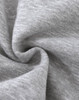 A close-up of soft, grey fabric with a slight texture, typical of a fleece jumper. It features a logo.
