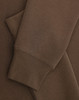 A brown crew fleece jumper with visible cuffs and fabric texture detail. Features a logo.