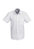 A white short sleeve button-up shirt with a pocket and a logo on the chest.