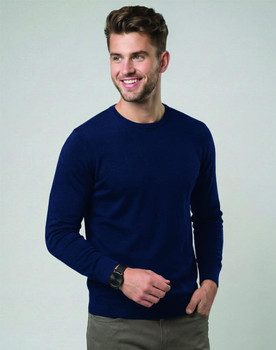 A long-sleeved men's tee shirt in blue, paired with black shorts and a red cap, held with a drink bottle.