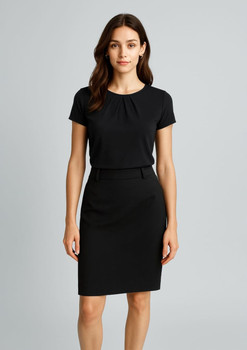A black women's multi-pleat skirt, styled with a matching black top, featuring soft fabric and a sleek design.