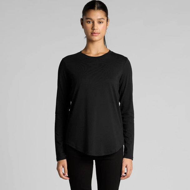 A long-sleeve black t-shirt with a curved hem and a logo. The model is standing front-facing.