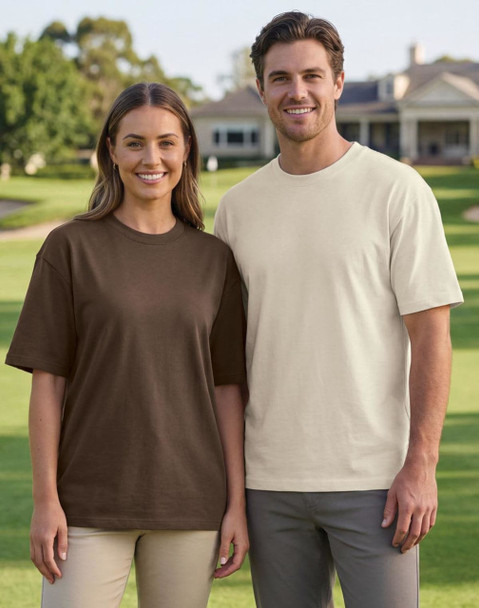 A brown and a cream unisex heavy cotton oversized tee worn by two models in an outdoor setting.