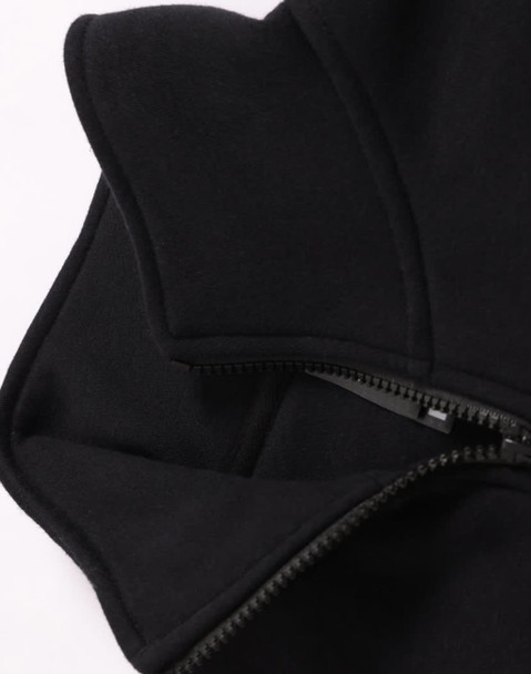 A black 1/2 zip collar fleece jumper featuring a smooth fabric texture and a zip closure, with a logo present.