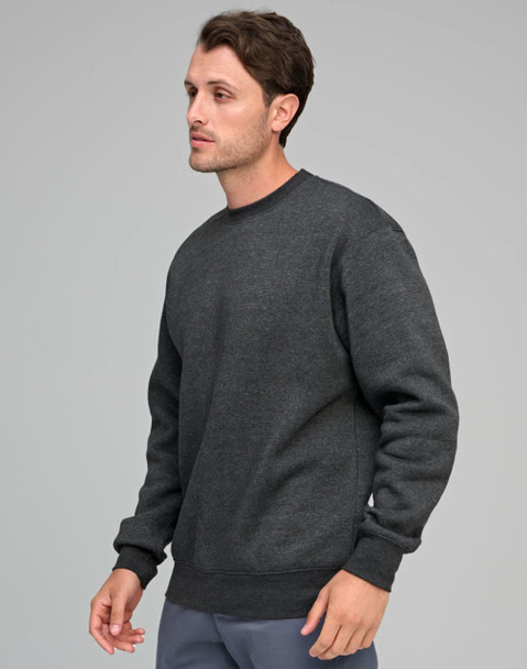 A man wearing a dark grey crew fleece sweatshirt, featuring a relaxed fit and ribbed cuffs.
